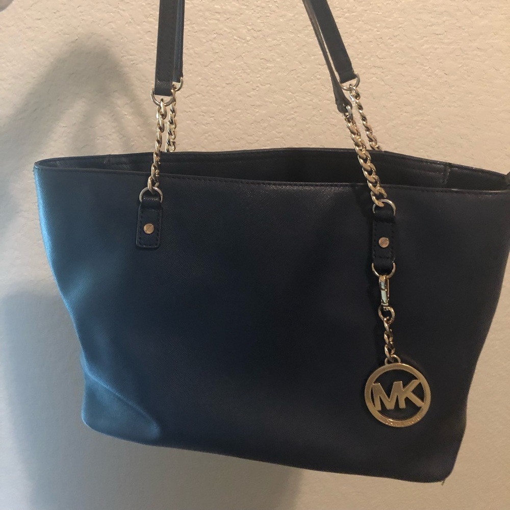 Micheal Kors medium size navy leather purse